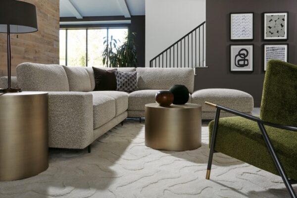 Thayer Coggin plush hangover living room sectional sofa paired with the green Kai lounge chair.