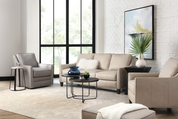 Bradington-Young leather sofa, ottoman, stationary & swivel chairs from the Christopher collection.