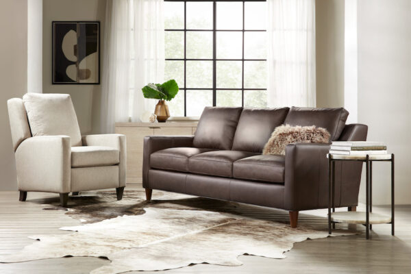 Bradington-Young small living room Melville stationary sofa with leather finish.
