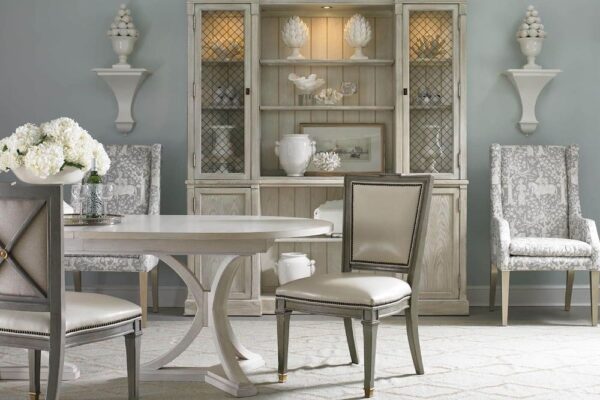 Hickory White Springbok oval dining table in sandstone finish.