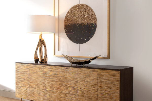 John-Richard Living Room Golden Circle display featuring Naro Sideboard, amorphic brass table lamp, and Hinode artwork.