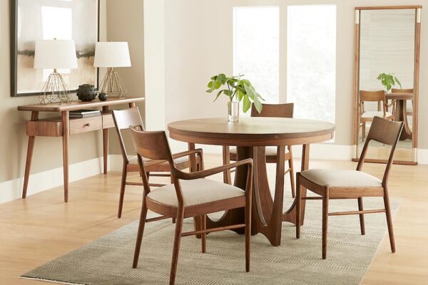 Stickley Furniture mid-century modern dining room table and chairs paired with a console table.